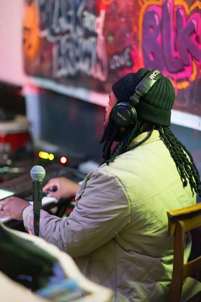 DJ at the decks in headphones