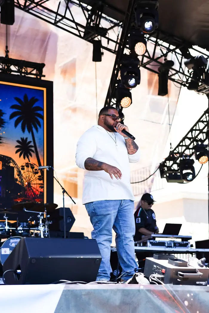 Vocalist performing on the festival stage